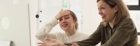 Boss explains error of employee in office close-up.