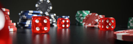 Red dice and colorful poker chips scattered on dark table