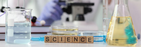 Word science collected with wooden cubes on laboratory table