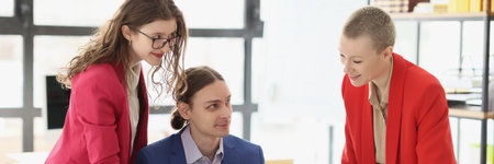 Positive colleagues discuss ideas of business in officeの写真素材