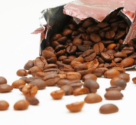 Spilled coffee beansの写真素材