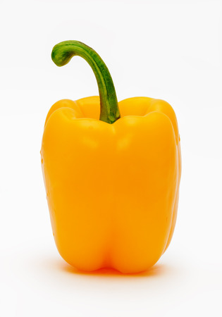 One yellow paprika isolated on white backgroundの写真素材