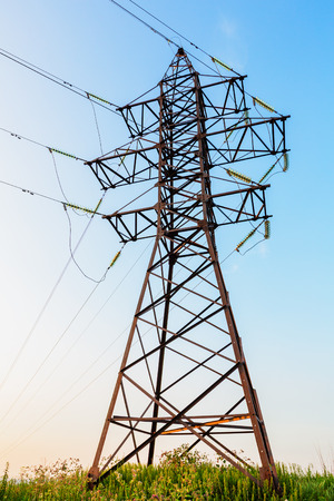 High voltage line beneath the evening skyの写真素材