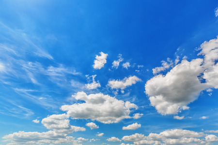 Background of blue sky with cumulus cloudsの写真素材