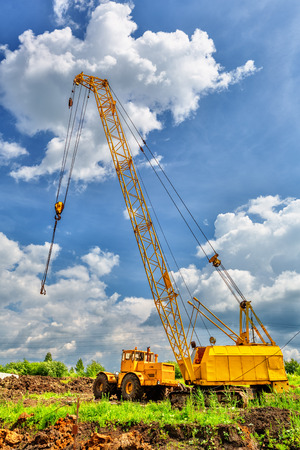 Mobile caterpillar crane on a background of blue skyの写真素材