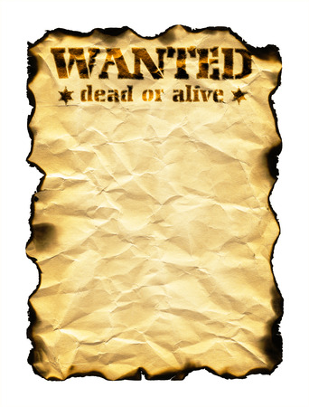 Old sheet of paper with burnt edges isolated on white background and words Wanted Dead or Aliveの写真素材