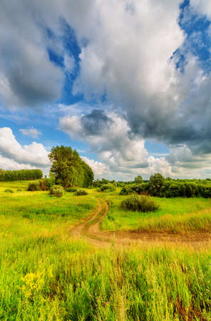 Blue sky with clouds over the hills. Rural landscapeの写真素材