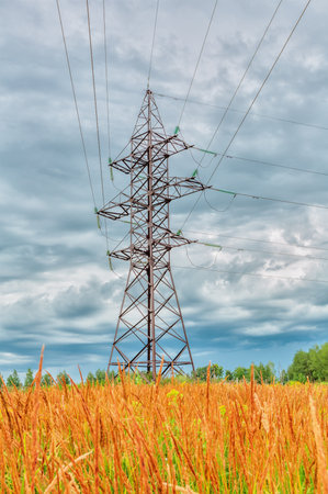 High voltage line on a background of cloudy skyの写真素材