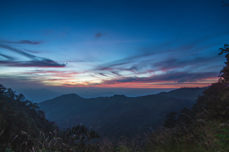 Mountain valley during sunset. Natural rainy season landscape in Thailandの写真素材