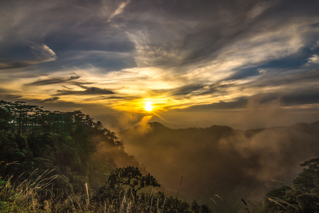 Mountain valley during sunset. Natural rainy season landscape in Thailandの写真素材