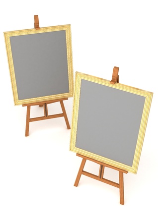 Easel with frame isolated on white backgroundの写真素材