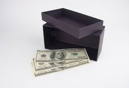 Dollar banknotes and storage boxの写真素材