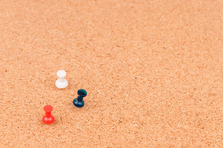 Thumb tacks on Office Cork Boardの写真素材