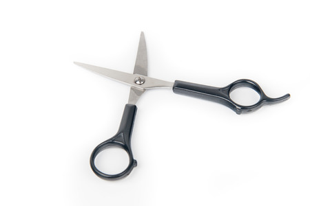 Metal scissors isolated on white background