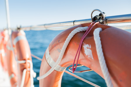Red and White Safety equipment on the sail boat