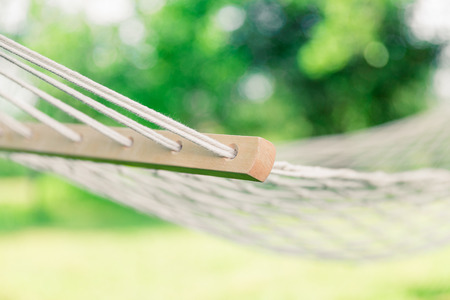 White hammock among the trees at summer dayの写真素材