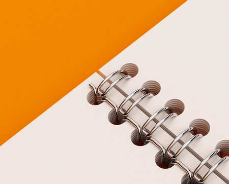 3D Illustration of Notepad with spring on color backgroundの写真素材