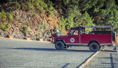 Dim Cave, TURKEY - OCTOBER 20 2018: Jeep driver is thinking on parking about cave