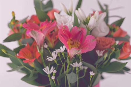 Beautiful bouquet of flowers. Holiday Background with flowersの素材