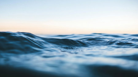 Close-up of tranquil water reflecting the sky above, showcasing calmness and natural beauty,.の素材