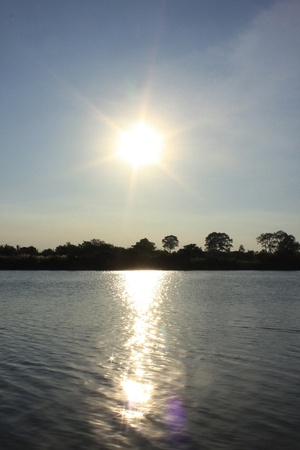 Sunset and reflections river in Kanchanaburi (Thailand).の写真素材