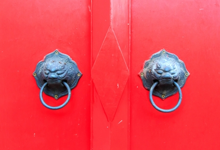 Tap door red  make same lion shape.の写真素材