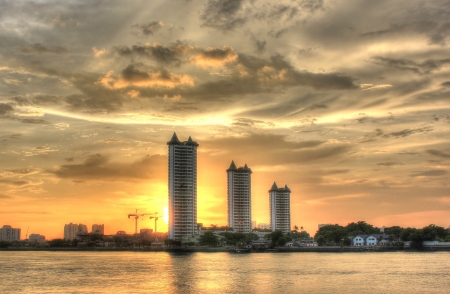 Three buildings on sunsetの写真素材