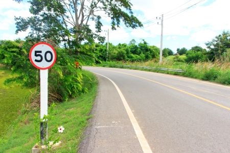 Sign on way cuve is drive car speed not overload 50 kmの写真素材