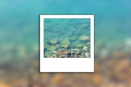 Sea is clean and have rocks on background blur and instant phortoの写真素材