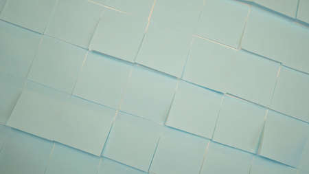 Blue stickers on the wall. Empty paper sticky, notepapers