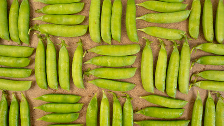Green fresh peas background. Geometric pattern, vegetatian food harvesting
