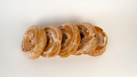 Custard cake with cottage cheese. Baking donuts on a white background, delicious sweets.