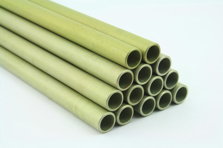 stack of  green aluminum tubes