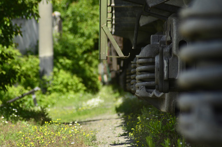 Landscape with a freight train. Railway carriage in spring seasonの写真素材