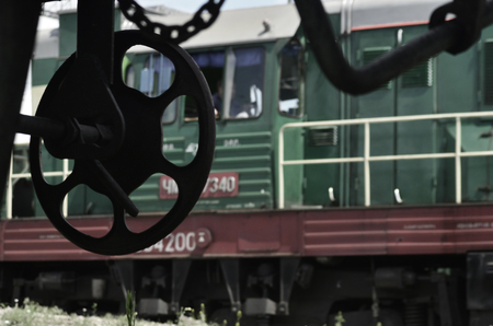 Landscape with a freight train. Railway carriage in spring season