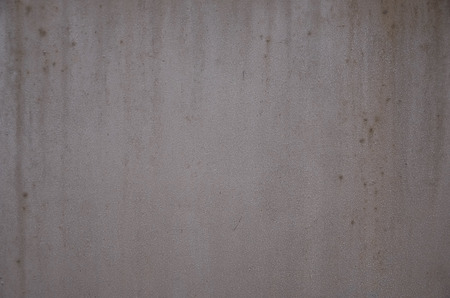 Rusty metal texture with scratched surface. Old painted metal wall with peeling paint. Texture obsolete painting metal fence close-upの写真素材