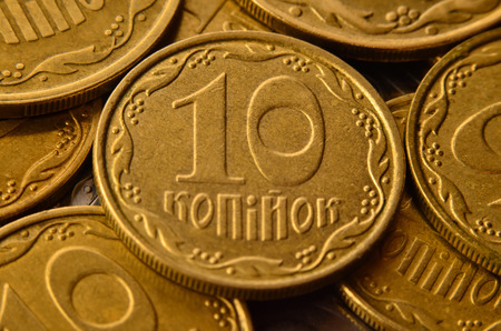 Detailed macro shot of Ukrainian money coins in the form of cash cents. Ukrainian kopeck with...