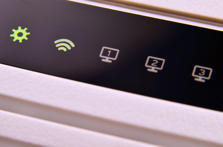 Detailed photo light bulbs from the Internet modem. Abstract technology background. Modern glowing...