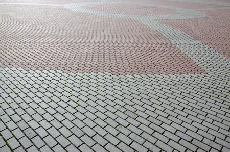 A large area, covered with a quality paving stone in daylightの写真素材