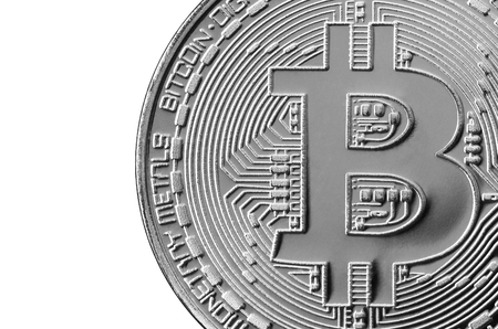 Bitcoin. Physical bit coin. Digital currency. Cryptocurrency mining concept. Silver coin with bitcoin symbols isolated on white backgroundの写真素材