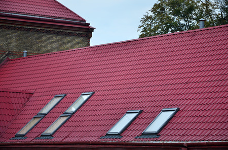 Fragment of a metal roof of the restored old multi-storey building in Lviv, Ukraineの写真素材