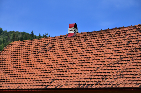 The roof of this square ceramic tile is red. The old type of roof covering in rich houses of the 19th centuryの写真素材