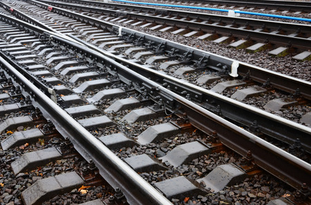 Photo fragment of the railroad tracks in the rainy weather