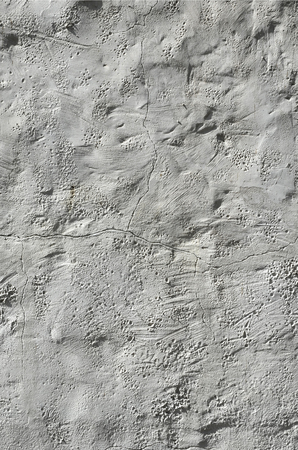 Close up shot of grunge brown clay wall on a old house. The mixture of some other object such as wood and stoneの写真素材