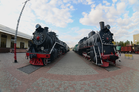 Photo of old black steam locomotives of the Soviet Union. Strong distortion from the fisheye lensのeditorial素材