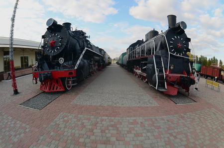 Photo of old black steam locomotives of the Soviet Union. Strong distortion from the fisheye lensのeditorial素材