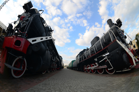 Photo of old black steam locomotives of the Soviet Union. Strong distortion from the fisheye lensのeditorial素材