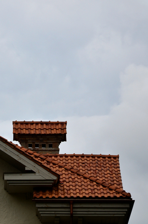 The house is equipped with high-quality roofing of ceramic tiles. A good example of perfect roofing. The building is reliably protected from adverse weather conditionsのeditorial素材