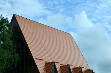 The house is equipped with high-quality roofing of metal tiles. A good example of perfect modern roofing. The building is reliably protected from adverse weather conditionsのeditorial素材
