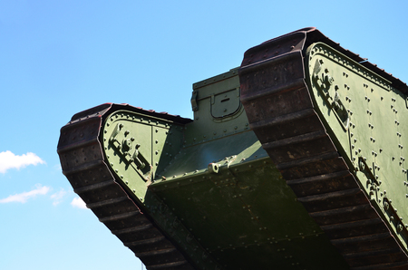 Caterpillars of the green British tank of the Russian Army Wrangel in Kharkov against the blue skyのeditorial素材